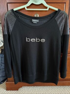 bebe Black Rhinestone Logo Pullover with Shimmer Shoulders